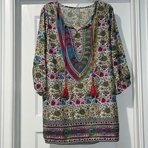 Lightweight, colorful, long sleeved, loose fitting dress/tunic